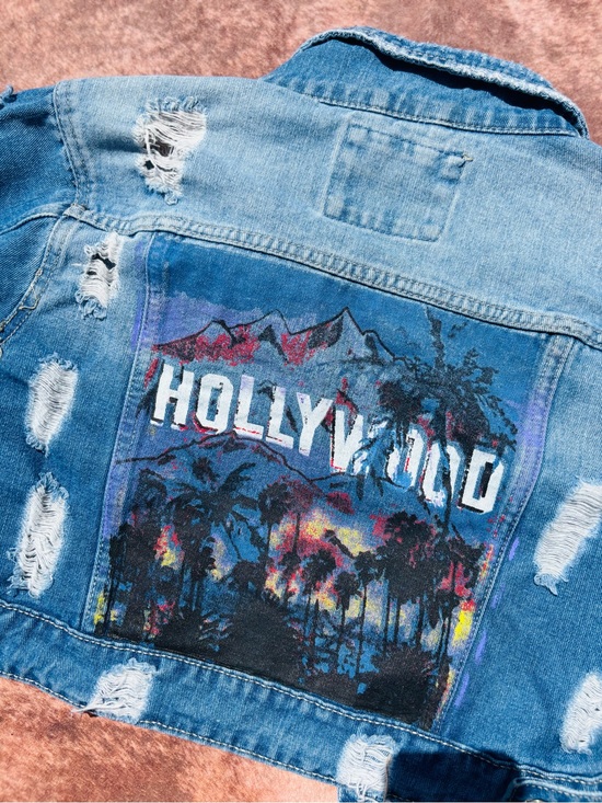American Bazi Jackets & Blazers - American Bazi Light Blue Distressed Denim Jacket with Hollywood Graphic